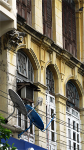 Satellite Dish on Colonial Building Yangon Myanmar 2013 Image David DuByne